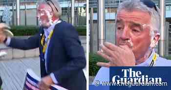 'It's delicious': Ryanair boss hit with cream cake in climate protest – video