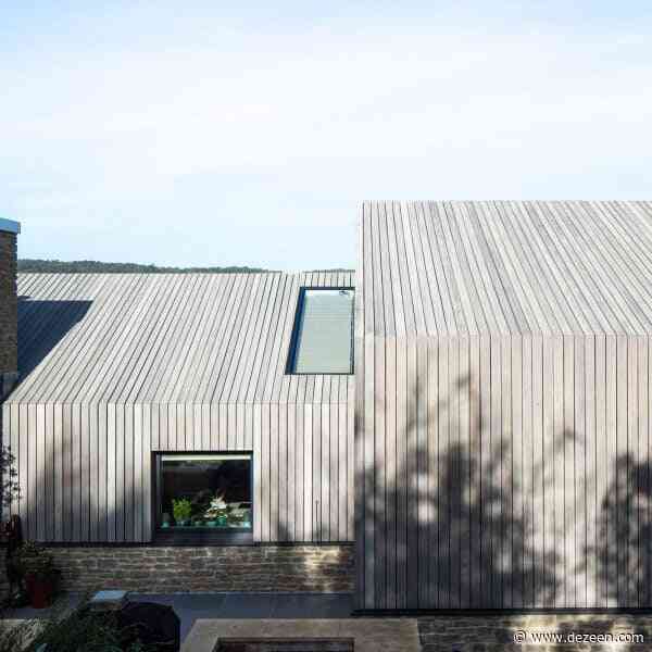 Coffey Architects draws on rural barns for coastal home in Dorset
