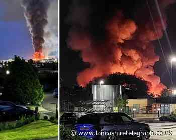 Fire crews remain at scene of huge Blackburn warehouse blaze