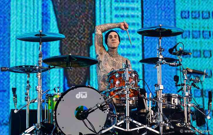 Watch Travis Barker gift a fan his drumsticks on Blink-182 tour