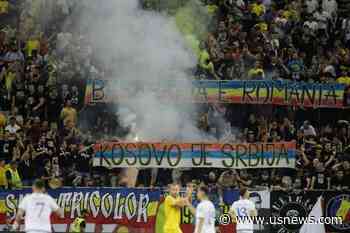 Soccer-Romania Beat Kosovo in Match Suspended After Serbia Chants