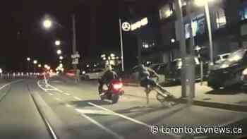 Video shows motorcyclist hit cyclist in bike lane after road rage in downtown Toronto