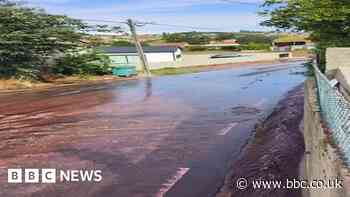 River of red wine floods Portuguese village after distillery mishap
