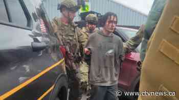 New photo released of arrest of escaped murderer who spent 2 weeks on the run