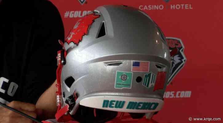 Lobo & Aggie football celebrating kids with disabilities during rivalry game