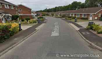 Arrest after car crashes into house and vehicles in Greasby