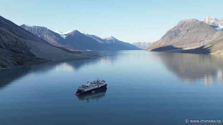 Luxury cruise ship pulled free after days aground in Greenland as COVID cases reported on board