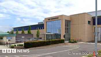 Prison officer's car firebombed outside jail