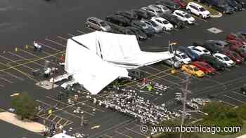 Emergency crews respond to scene of tent collapse in Bedford Park