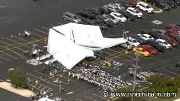 At least 26 hospitalized after tent collapse in Bedford Park, police say
