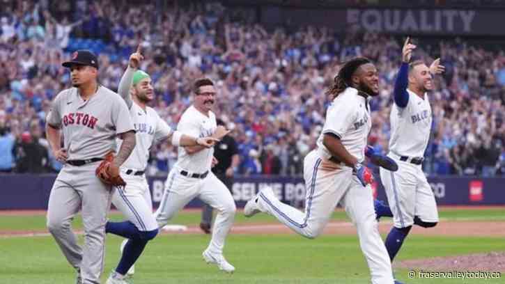 Blue Jays grind out 13-inning win over Red Sox
