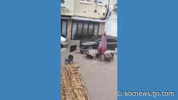 WATCH:  Furniture washed away as floods hit Spain