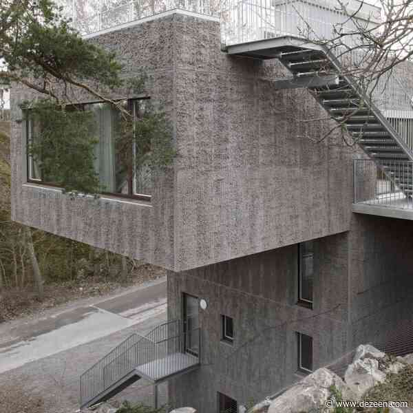 Spridd slots T-shaped house into rocky hillside in Stockholm