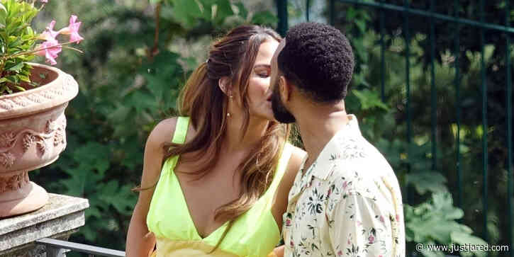 Chrissy Teigen & John Legend Share a Sweet Kiss During Anniversary Pool Party