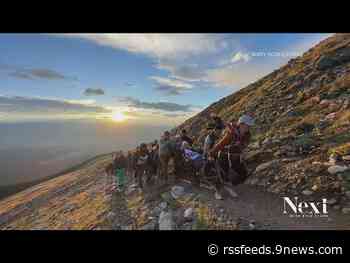 Paralyzed hiker summits Mount Elbert, with some help
