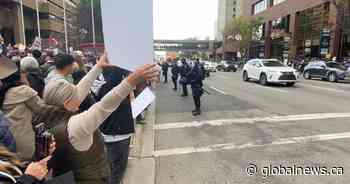 ‘Million March 4 Children’ draws hundreds of supporters, counter-protesters in downtown Calgary