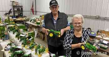 Alberta couple sells off ‘very impressive’ collection of John Deere memorabilia