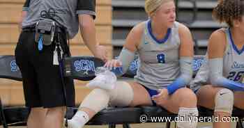 Girls volleyball: Warren, Benet surive upset-minded St. Charles North
