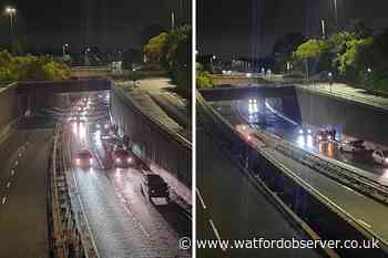 Cars caught in Watford A41 flooding after heavy rain