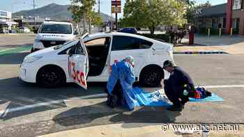 Taxi driver stabbed and offender on the run after violent attempted robbery in north Queensland