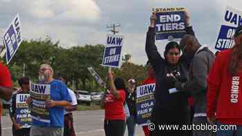 UAW announces progress with Ford, expands strike with GM and Stellantis