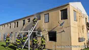 Couple hospitalized, woman critical after fire erupts in Liberty City building