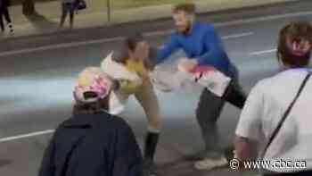 Video appears to show man drag sex work activist during Hamilton march against violence