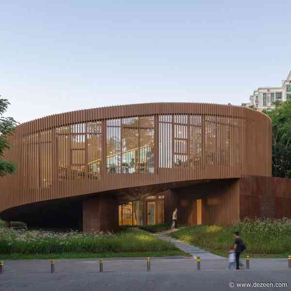 Spiralling library by Atelier Xi "unfolds like a scroll painting"