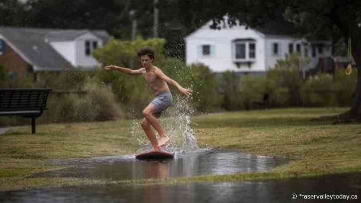Tropical Storm Ophelia makes landfall in North Carolina as coastal areas lashed with heavy rain