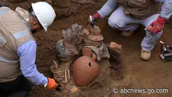 Workers uncover eight mummies and pre-Inca objects while expanding the gas network in Peru