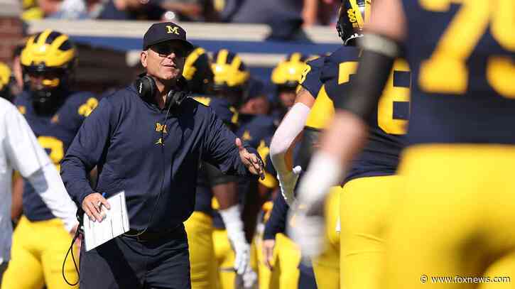 Michigan overcomes slow start to defeat Rutgers in Jim Harbaugh's return from 3-game suspension