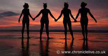 Hundreds of people brave the cold to take part in annual Druridge Bay Skinny Dip