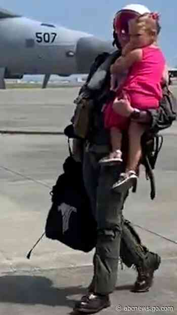 WATCH:  Girl runs to hug navy dad when he returns from deployment