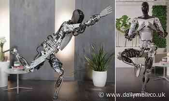 Downward facing BOT! Watch as Tesla's humanoid robot Optimus performs yoga