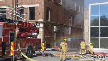 Commercial heritage building continues to burn for second day in downtown Regina