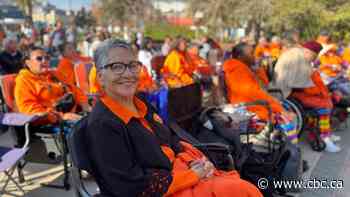 'We're wounded': Calls for action ring out at flag-raising honouring residential school survivors