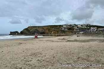 Drowning woman saved by surfer as 'hundreds of onlookers taking selfies' watched on