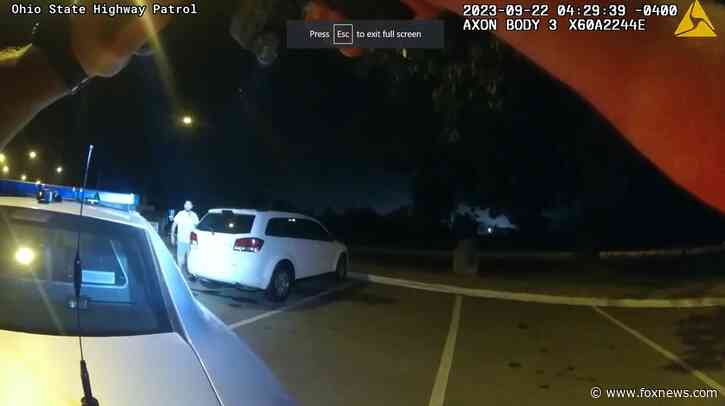 Wild bodycam footage of fugitive daring cops to shoot him before high-speed chase