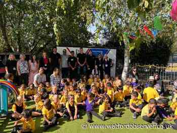 Watford FC players unveil Laurence Haines Primary School sports mural