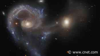 Peculiar Galaxies Collide in Haunting NASA Hubble View     - CNET