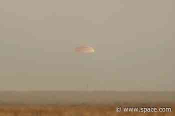 Record-setting NASA astronaut lands with Russian crewmates after 1 year on space station