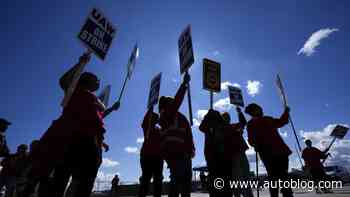 5 workers on UAW picket line struck by car at GM plant