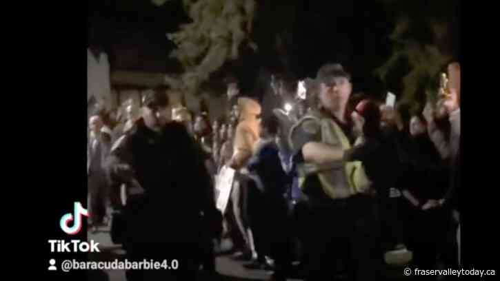 Abbotsford Police escort Abbotsford school board trustees following protests at meeting