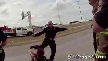 Fired Dallas paramedic caught on camera kicking, punching homeless man gets reinstated but demoted