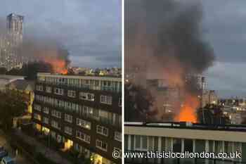 Police probe after fire in block of flats near Canary Wharf