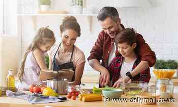 Why a family meal is so important: Children who eat dinner without their dads are unhappier - even if their mum is there, study finds