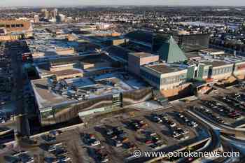 Man dies in Edmonton mall parkade after standing up through car sunroof: police