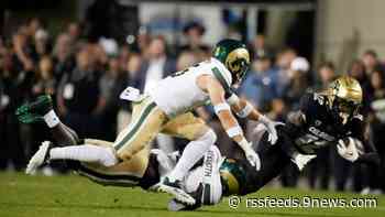 CU Buffs' Travis Hunter and CSU Rams' Henry Blackburn meet up to go bowling