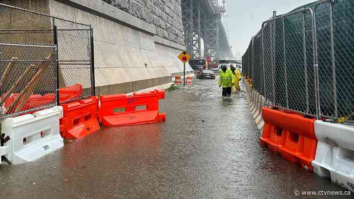 New York City area gets one of its wettest days in decades, as rain swamps subways and streets