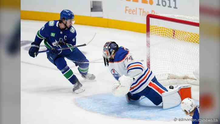 Hughes helps Canucks power past Oilers 5-2